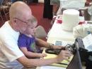 Is Hope the youngest 6m Field Day (FD) operator in Oak Ridge (Tennessee) Amateur Radio Club history?  Hope Hargis (2-3/4 years old) is assisting K4LF, Charlie (a.k.a. grandpa), to make contact with one of eight VE3/VA3 stations on the 6m band on Saturday afternoon, between 20:46 and 21:48Z.

These stations were in the Canadian province of Ontario tightly packed around the city of Toronto.  The first three stations were worked in a period of three minutes for a QSO rate of 60 per hour; not too shabby for the young, rookie operator.